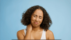 26. african-american-lady-suffering-from-nech-pain-over-blue-background-SBV-346730940-HD