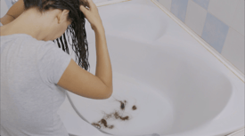 28. hair-problems-the-girls-hair-falls-out-into-the-sink-while-washing-SBV-338711229-HD